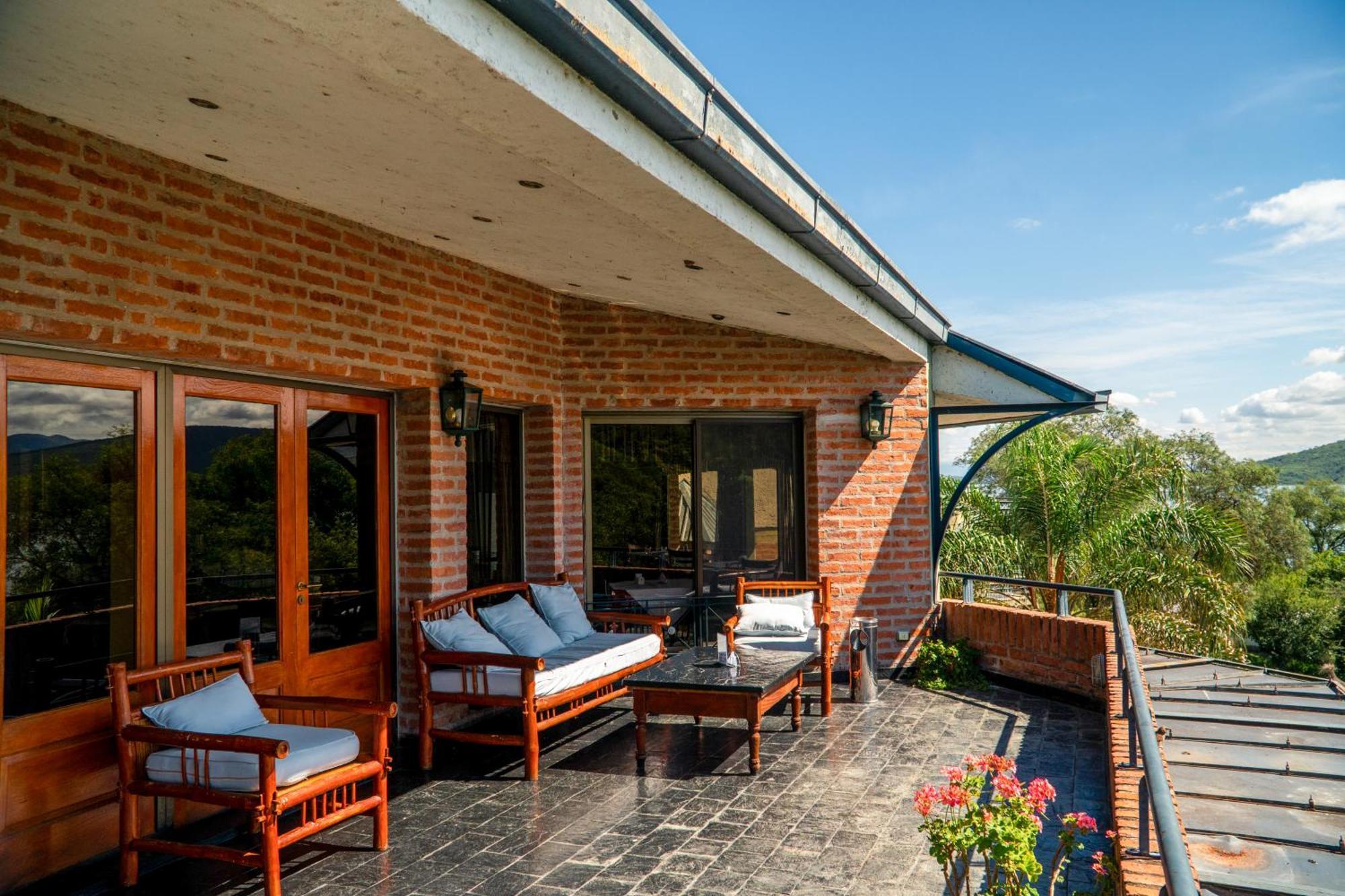Hotel Del Dique Cabra Corral Bagian luar foto